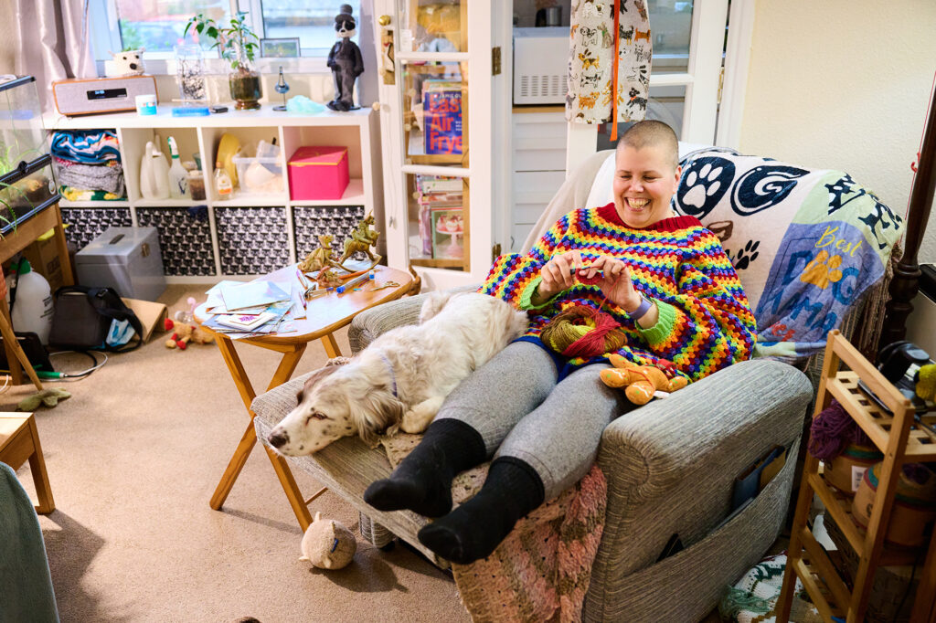 Pam Richardson, tenant in her retirement apartment with her assistance dog