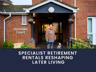 Resident and dog standing at the entrance to retirement development in Devon